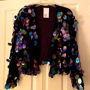 Divided openfront top.. Dress up any outfit. Really pops a look.Especially black